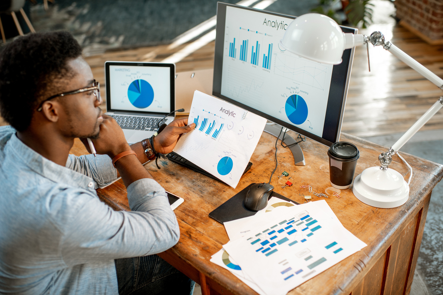 Man Working with Analytics at the Office